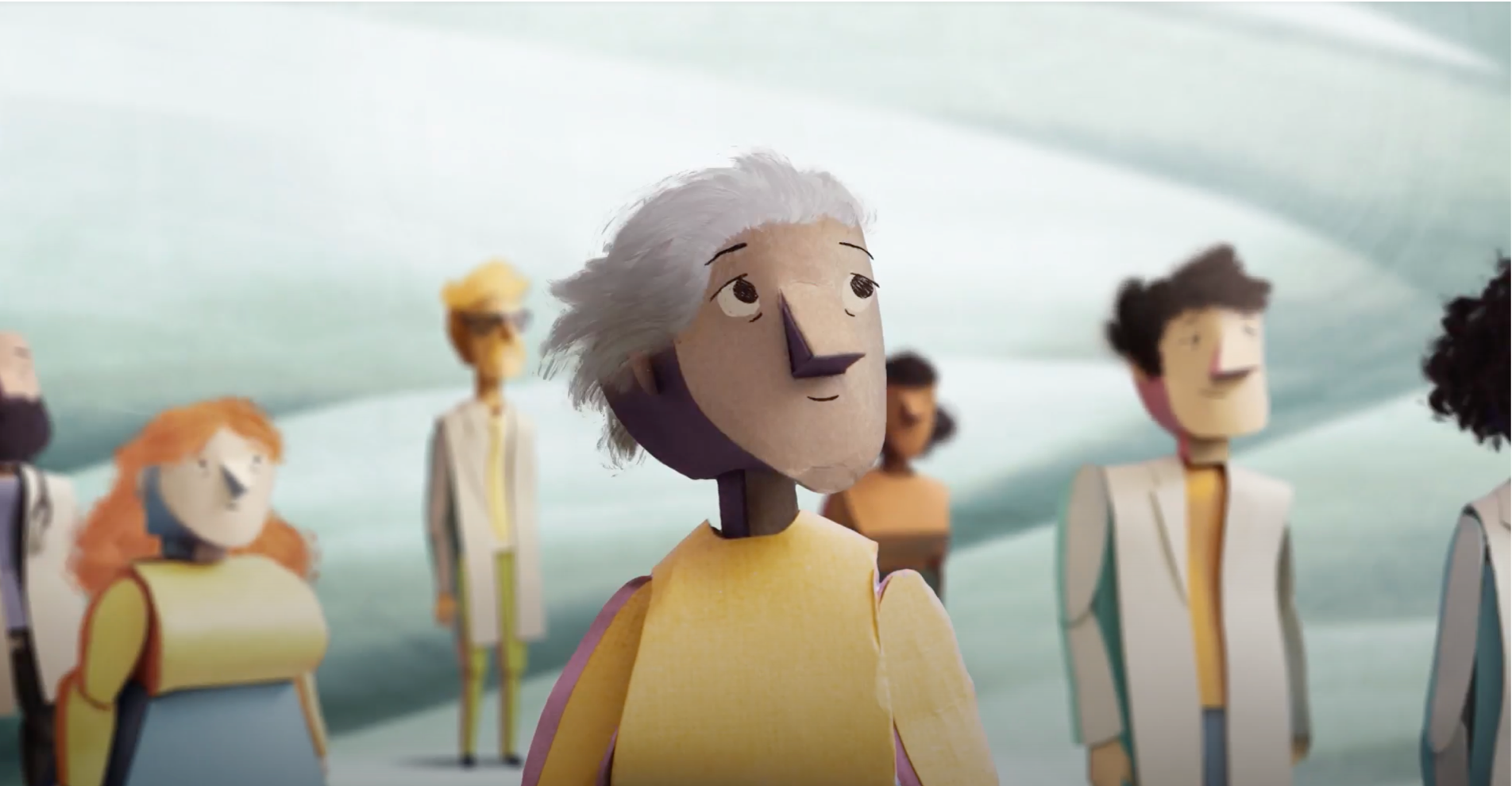 Still from the animated video of a group of people smiling