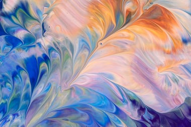 abstract waves of purple and orange . 