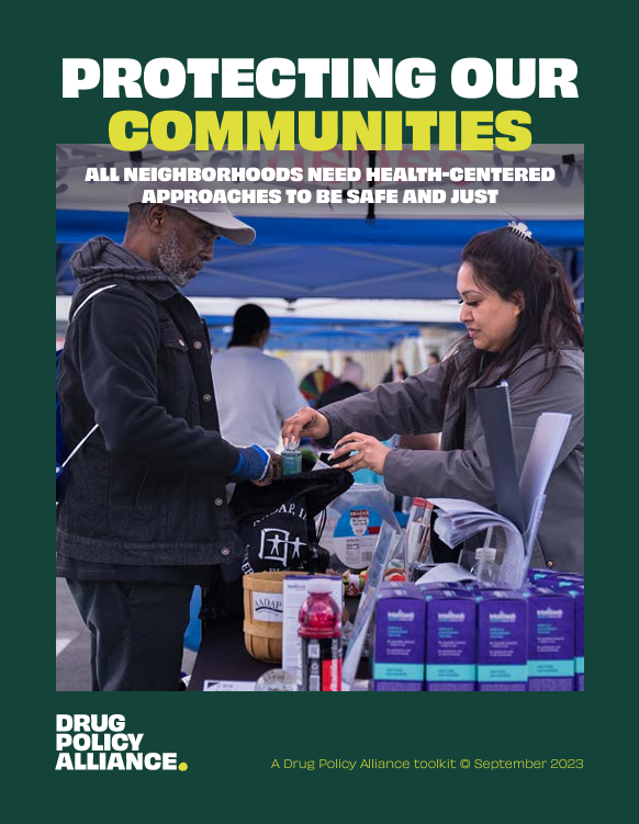 Cover page with title of resource and photo of community action. 